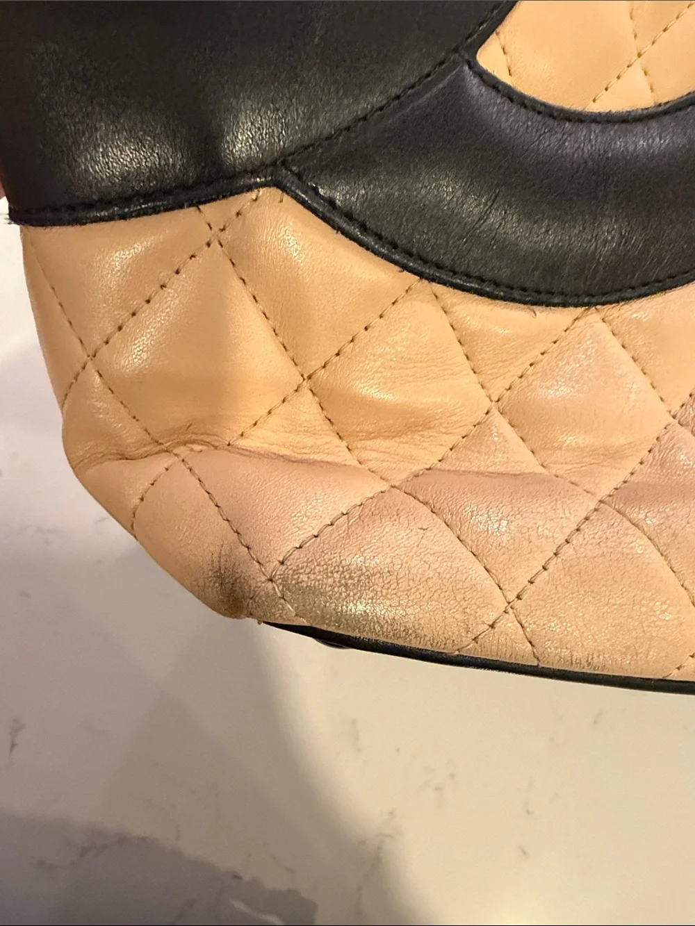 CHANEL Beige Quilted Tote with Black Accents